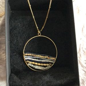 Simply Noelle World Circle Necklace 36” gold tone chain. Simply Unique!!